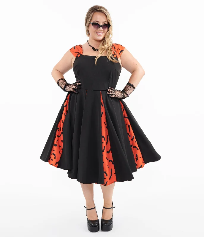 Unique Vintage Plus Size 1950s Orange & Black Bat Stripe Swing Dress